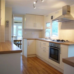 New kitchen in refurbished home at Merrywood Park, Box Hill, Surrey